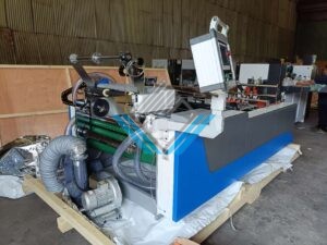 May dan bong kinh hop giay