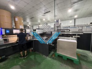 May xen giay nang ha tu dong