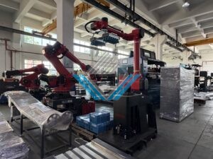 Robot dat ram giay vao thung carton