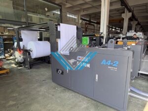 May cat giay ram a4 chia 2 ram