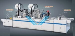 May dan giay chong dinh bang keo 2 may